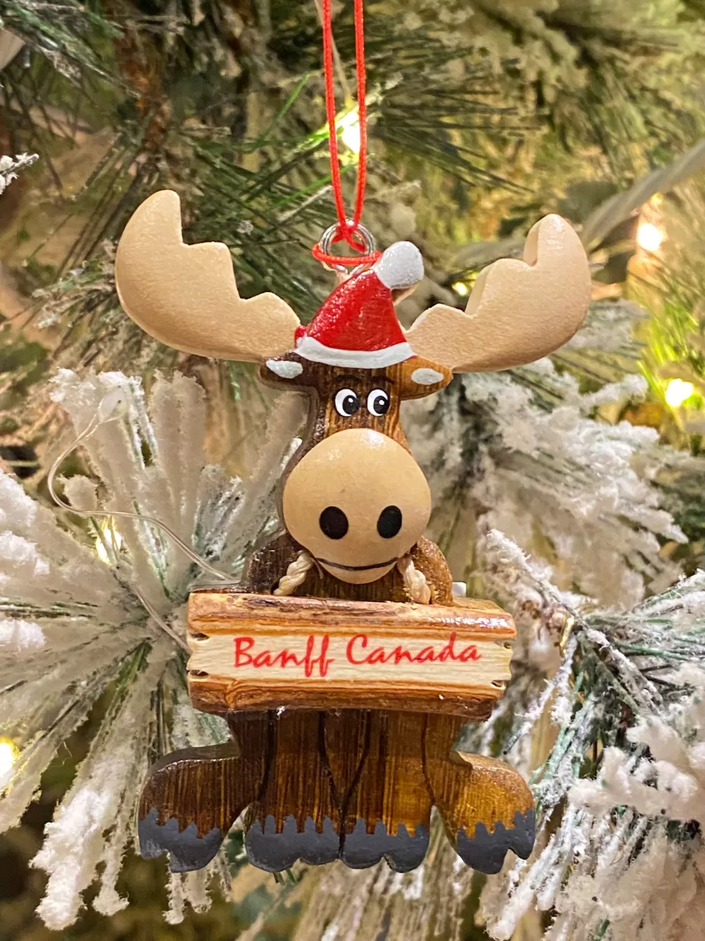 The Spirit of Christmas Banff And Canadiana | Moose>Moose With Santa Hat