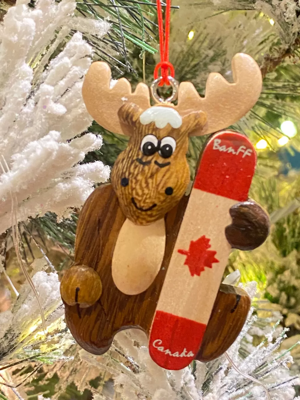 The Spirit of Christmas Banff And Canadiana>Wooden Moose With Snowboard